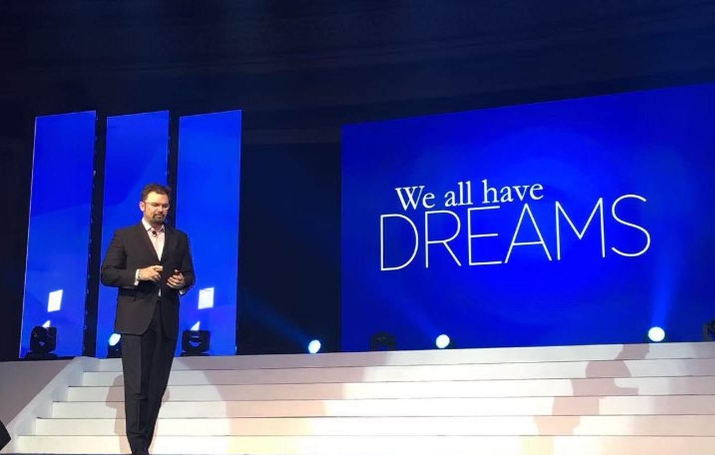 Adam Vincent Gilmer speaking on stage